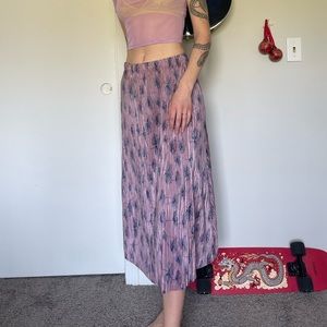 Pink floral midi skirt with elastic waist.